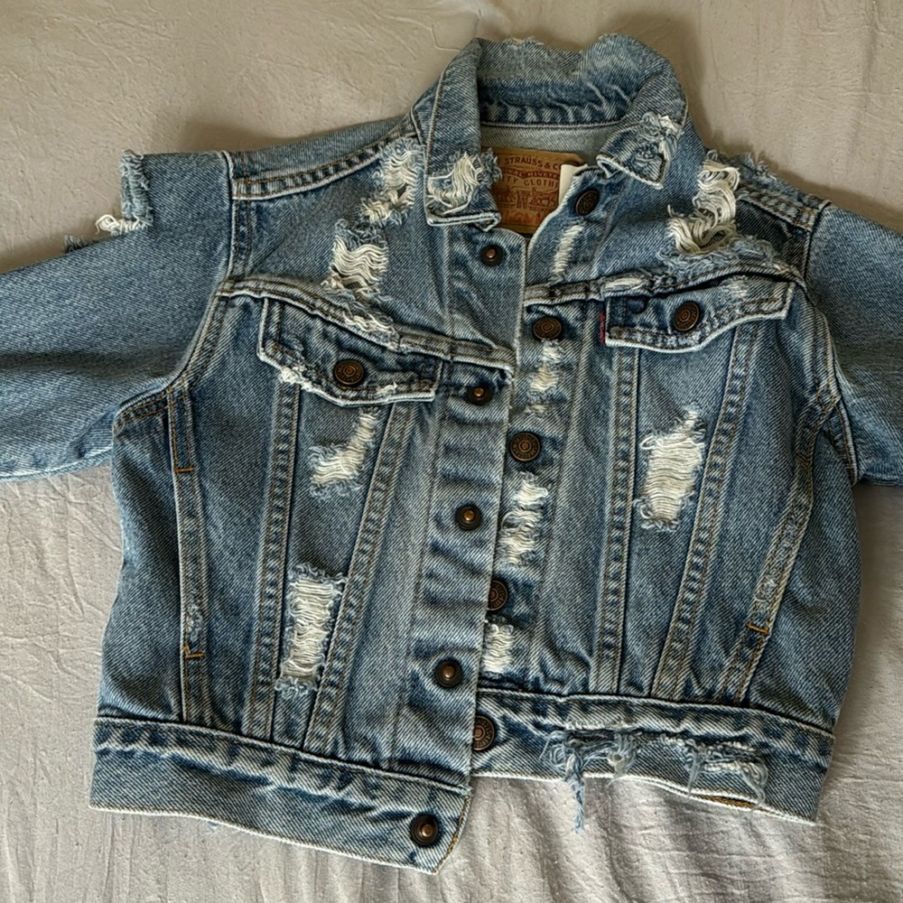 Levi’s distressed denim jacket, size 4
